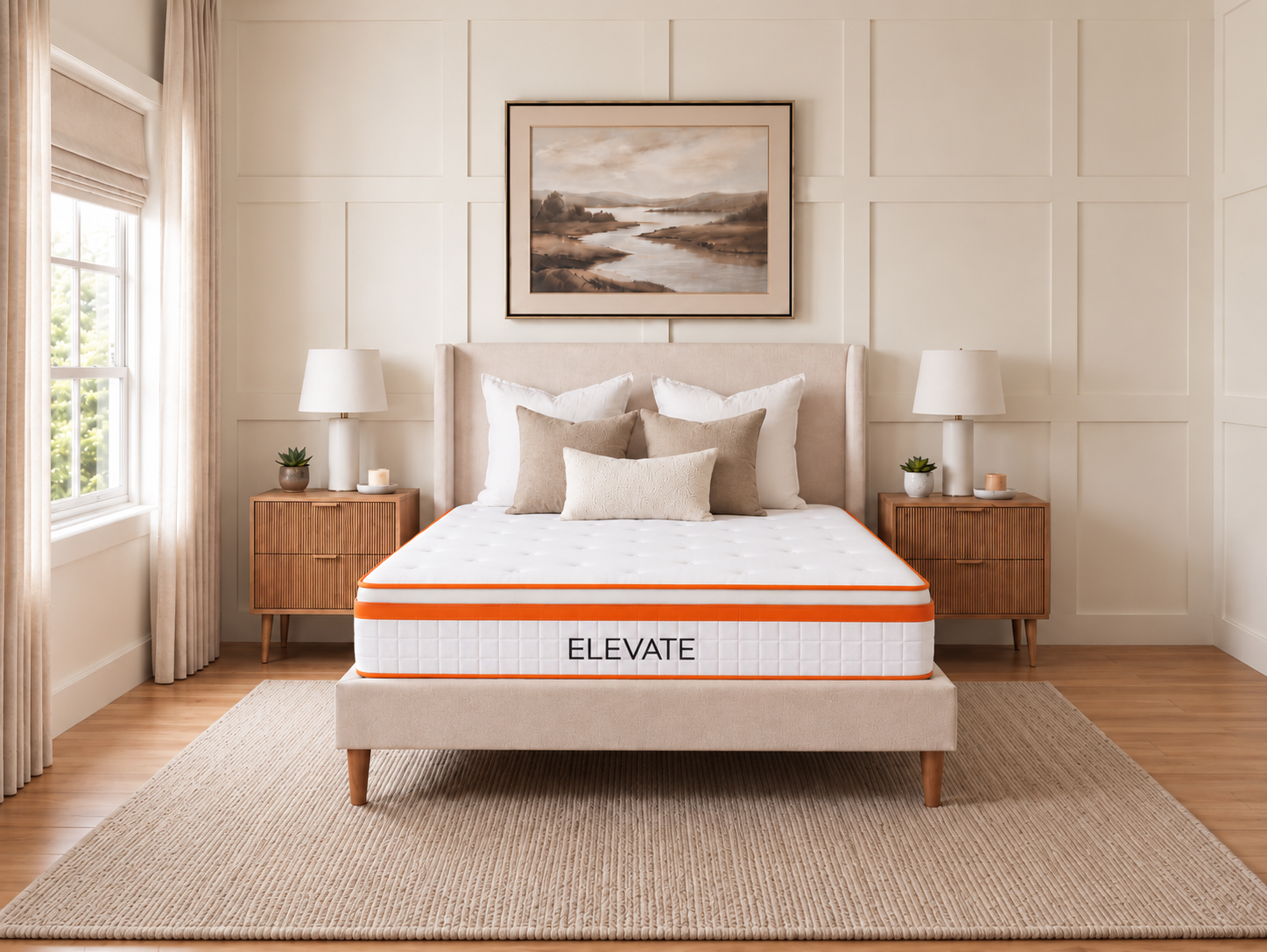 Beige bedroom with ELEVATE mattress on upholstered bed frame, flanked by wooden nightstands with lamps