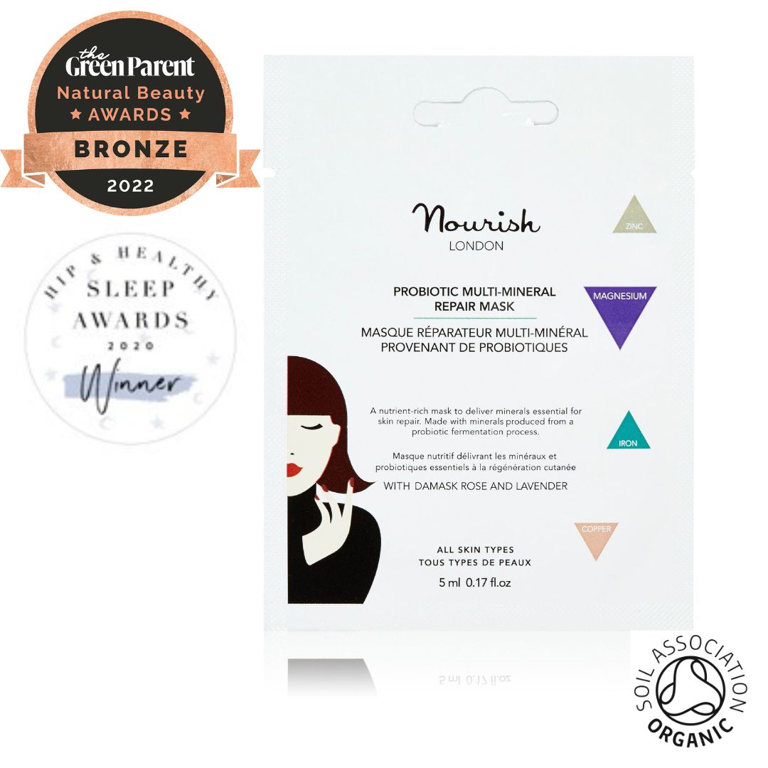 Nourish London probiotic mask packet displayed with award badges and certification logos